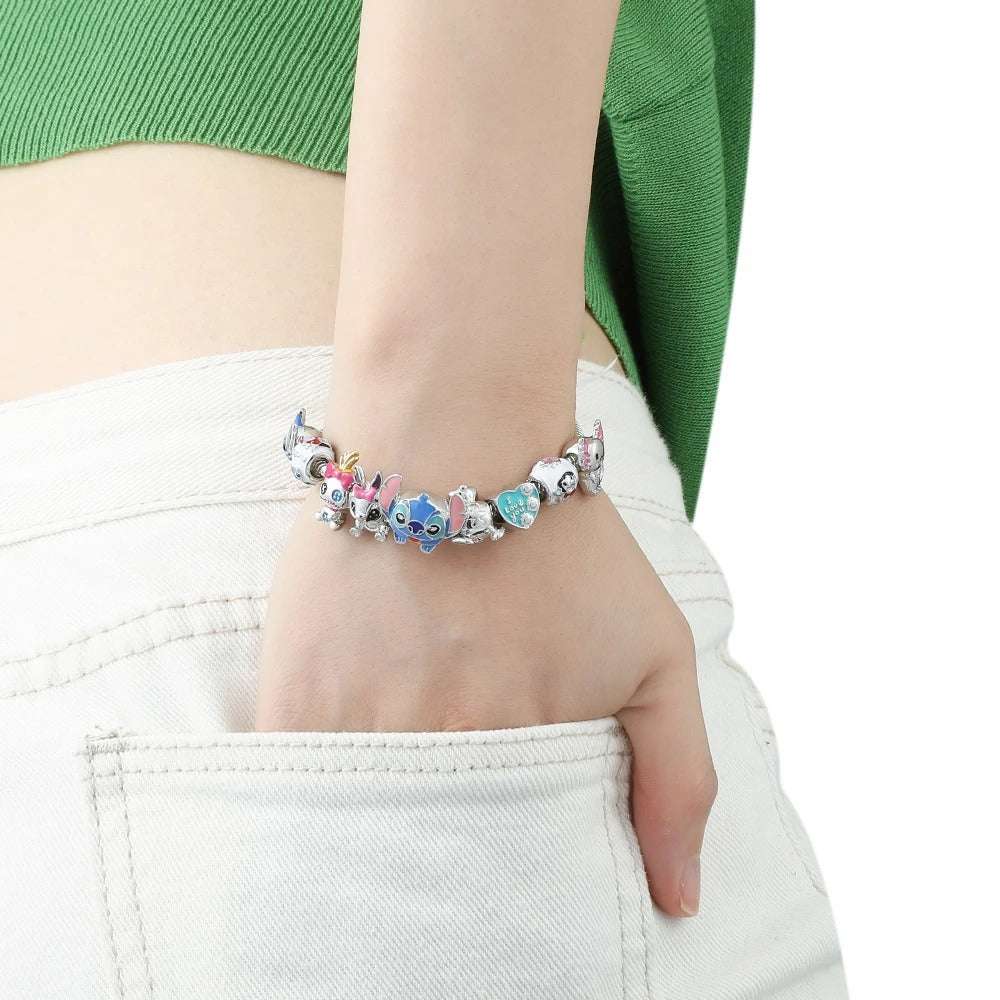 PULSEIRA PANDORA DISNEY STITCH COM BERLOQUES CRAVEJADOS PRATA 925 - PUL2599