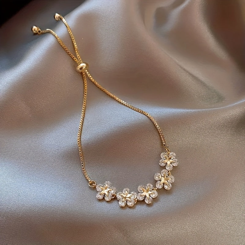 PULSEIRA FLORES BANHADA EM OURO 18K - PLSI 9421 - Menina Elegante