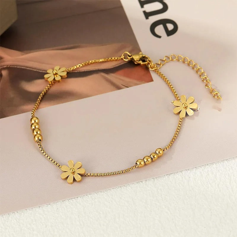 TORNOZELEIRA FLORES BANHADA EM OURO 18K - TOR422