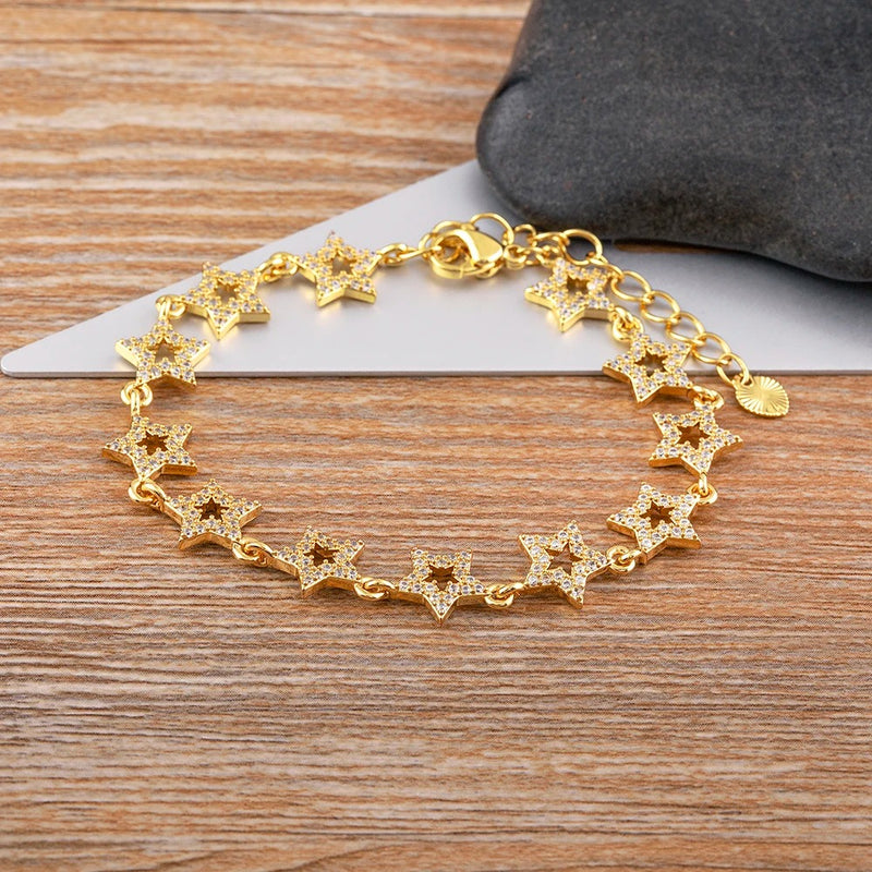 PULSEIRA ESTRELAS CRAVEJADAS BANHADA EM OURO 18K - PLS 132