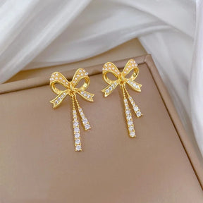 CONJUNTO LAÇOS CRAVEJADOS BANHADO EM OURO 18K - CONJ182