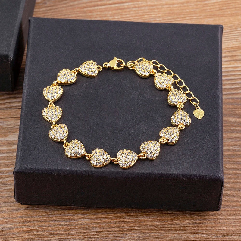 PULSEIRA CORAÇÕES CRAVEJADOS BANHADA EM OURO 18K - PLS 125