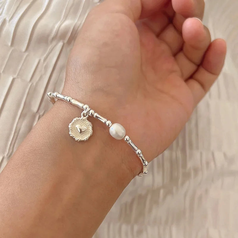 PULSEIRA PÉROLA E PONTOS DE LUZ PRATA 925 - PUL1520