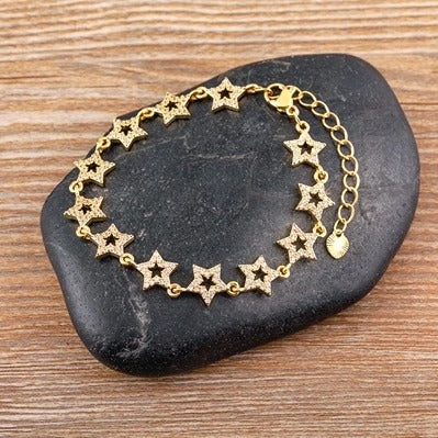 PULSEIRA ESTRELAS CRAVEJADAS BANHADA EM OURO 18K - PLS 132