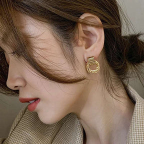 BRINCO ELOS ADORNADOS BANHADO EM OURO 18K - BRSI266