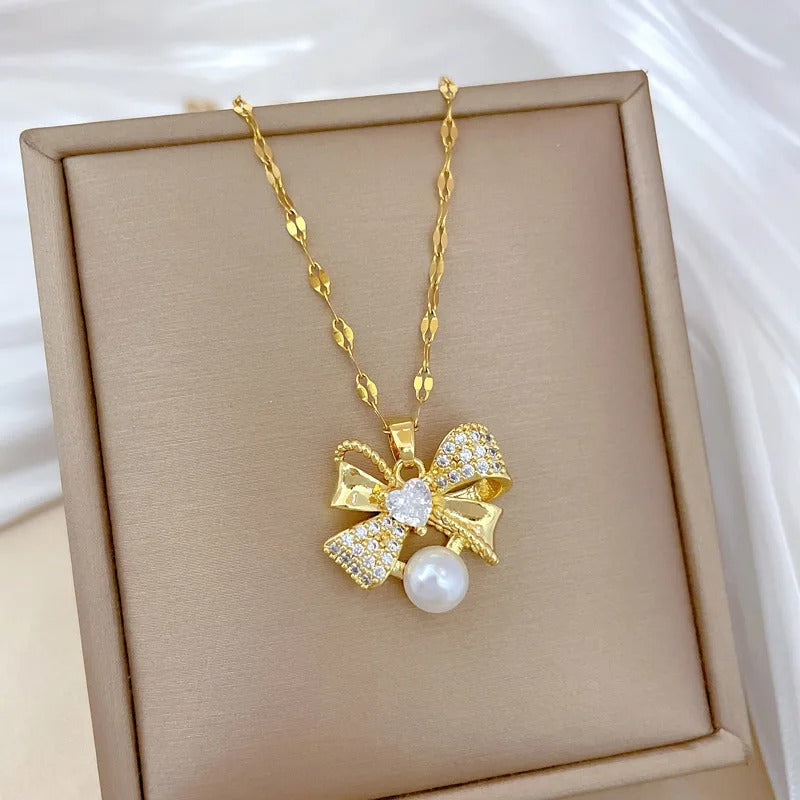CONJUNTO LAÇOS E PÉROLAS BANHADO EM OURO 18K - CONJ242